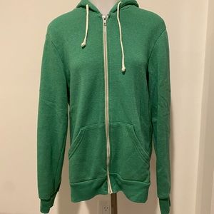 Green Alternative Earth sweatshirt.